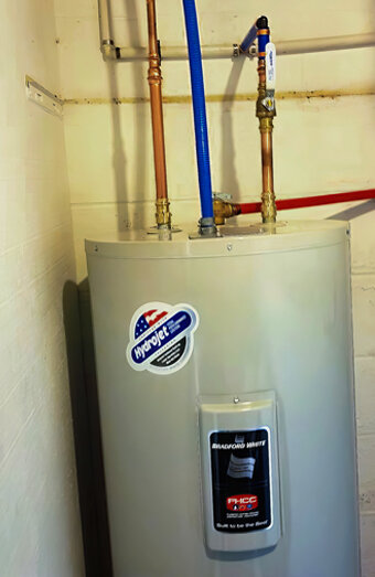 https://trigghotwater.com.au/uploads/2025/06/electric-hot-water-system-32554.jpg