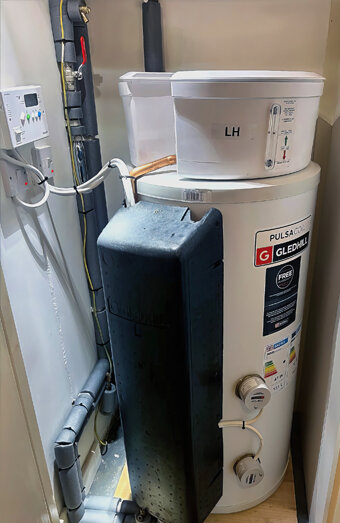 https://trigghotwater.com.au/uploads/2025/06/electric-hot-water-system-70649.jpg